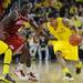 Michigan sophomore Trey Burke moves the ball around Indiana junior Victor Oladipo during the first half at Crisler Center on Sunday, March 10, 2013. Melanie Maxwell I AnnArbor.com